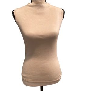 Ann Taylor mock top. Size medium. Cream color. 86% silk. Never worn.